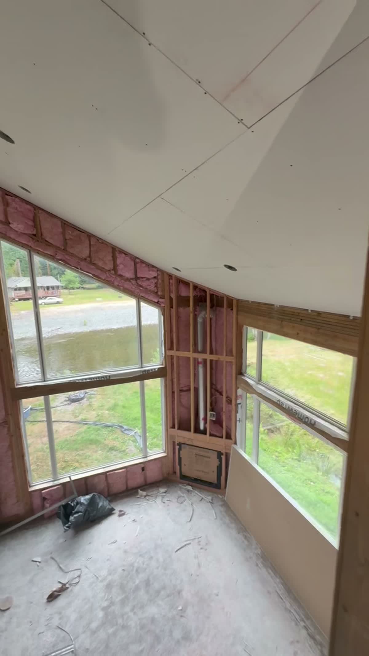 Framed room with insulation before drywall, lakefront home, Jefferson County WA