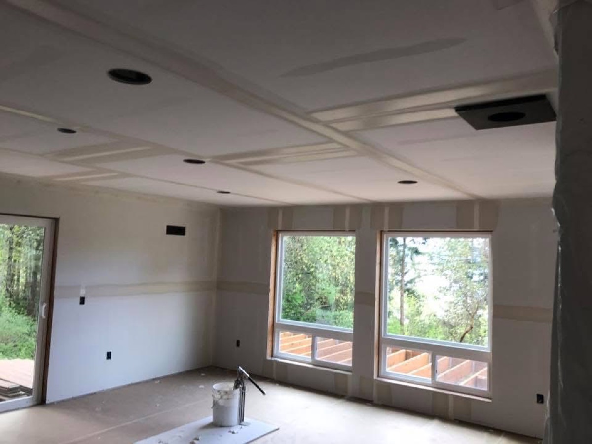 Taped great room with picture windows and deck, Jefferson County WA