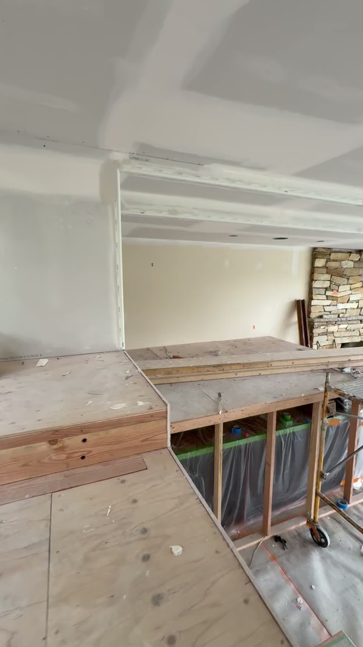 Remodel drywall in progress around stone fireplace, Jefferson County WA